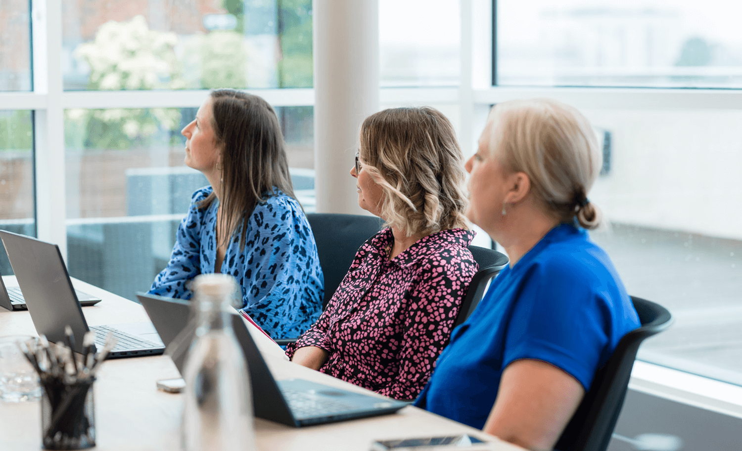 Consortium Team Listening to presentation